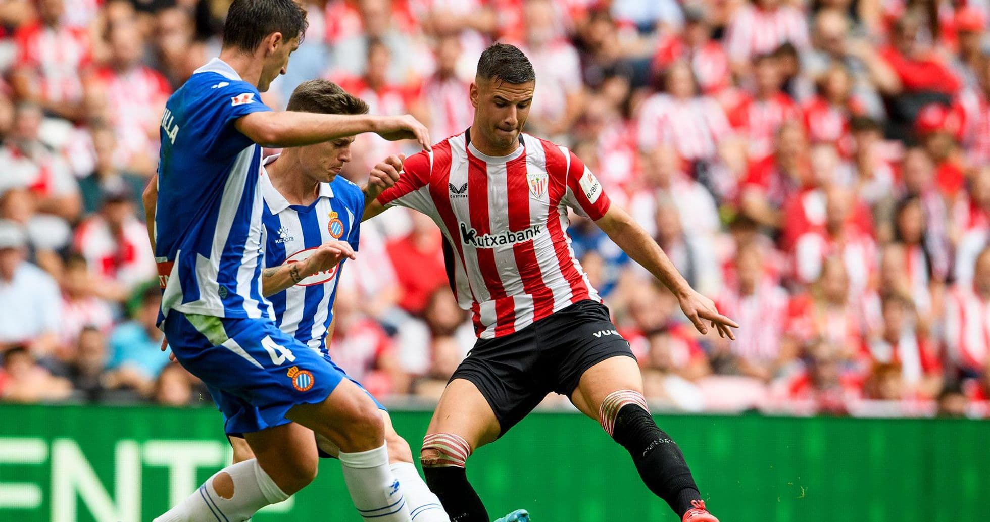 Espanyol and Athletic Club players contesting the ball Espanyol and Athletic Club players contesting the ball