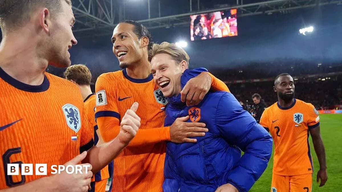 Dutch players celebrating on the pitch after match Dutch players celebrating on the pitch after match