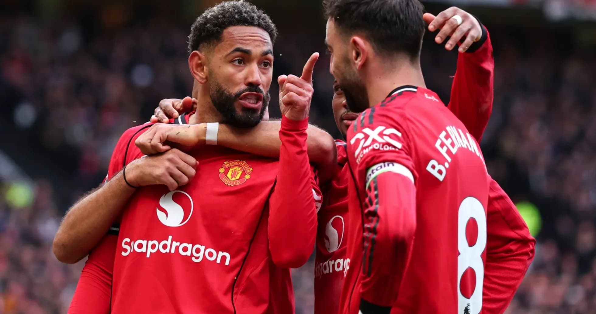 Manchester United players celebrating and discussing during match Manchester United players celebrating and discussing during match