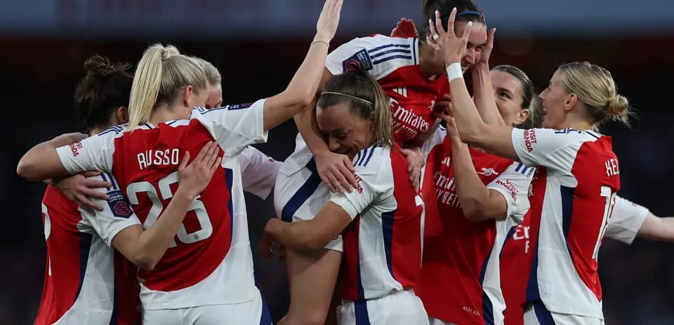 Arsenal W players celebrating a goal Arsenal W players celebrating a goal
