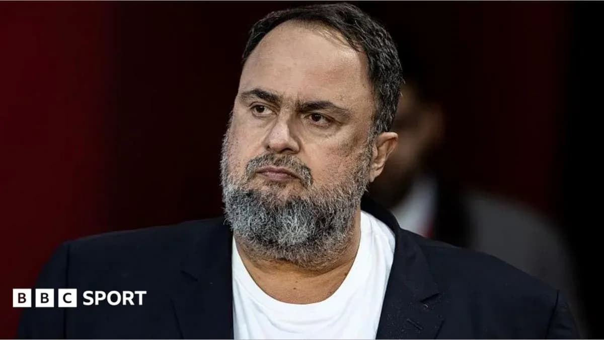 Man with beard wearing a black blazer Man with beard wearing a black blazer