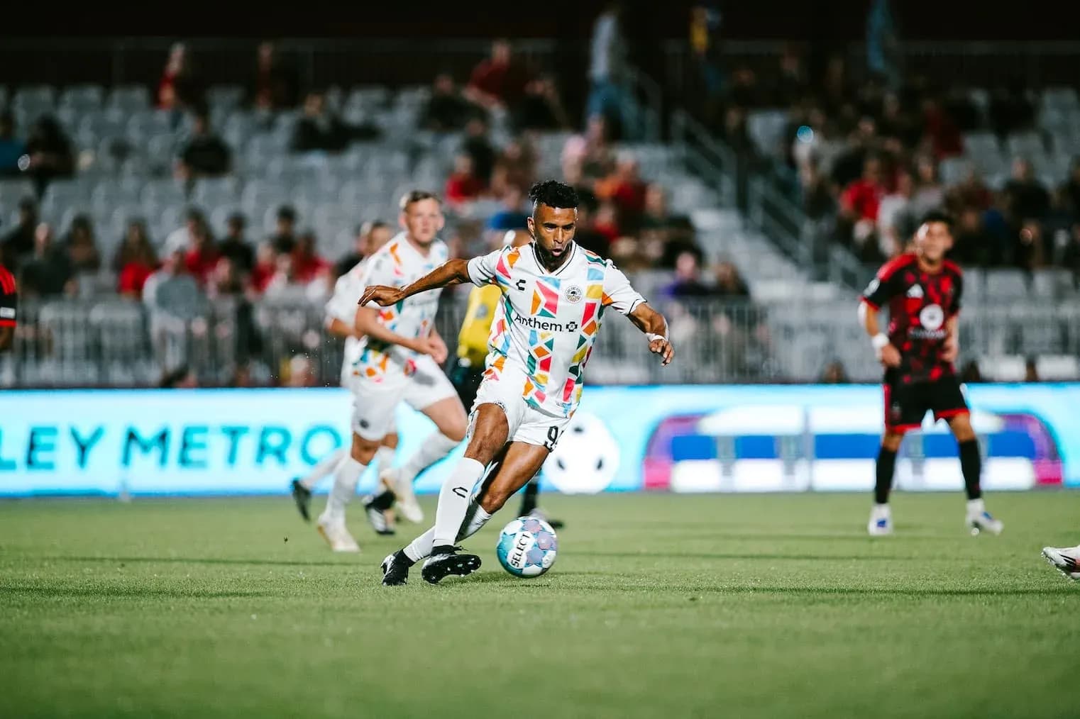 Player dribbling the ball during Phoenix Rising match Player dribbling the ball during Phoenix Rising match