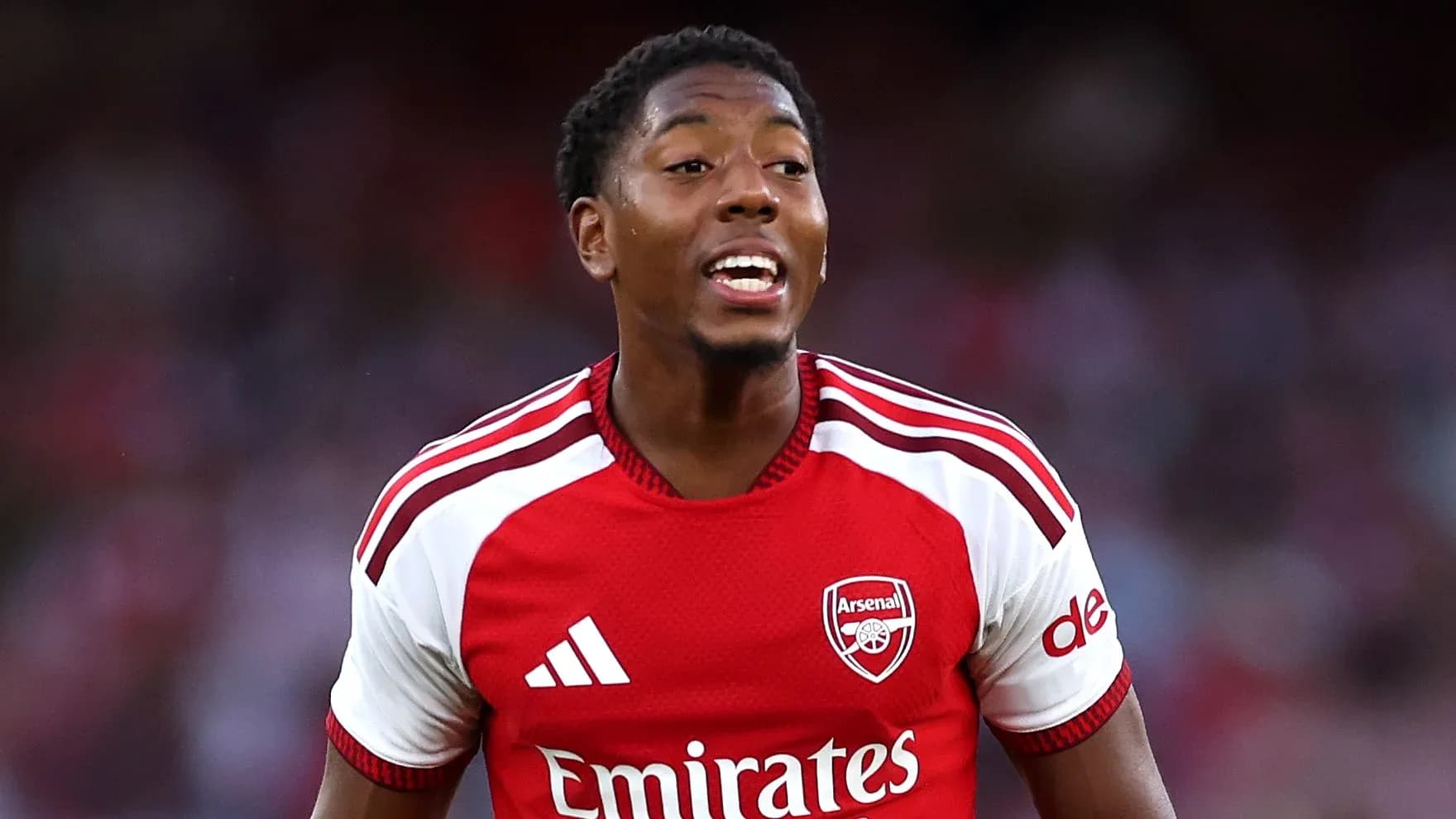 Player celebrating during Arsenal match Player celebrating during Arsenal match