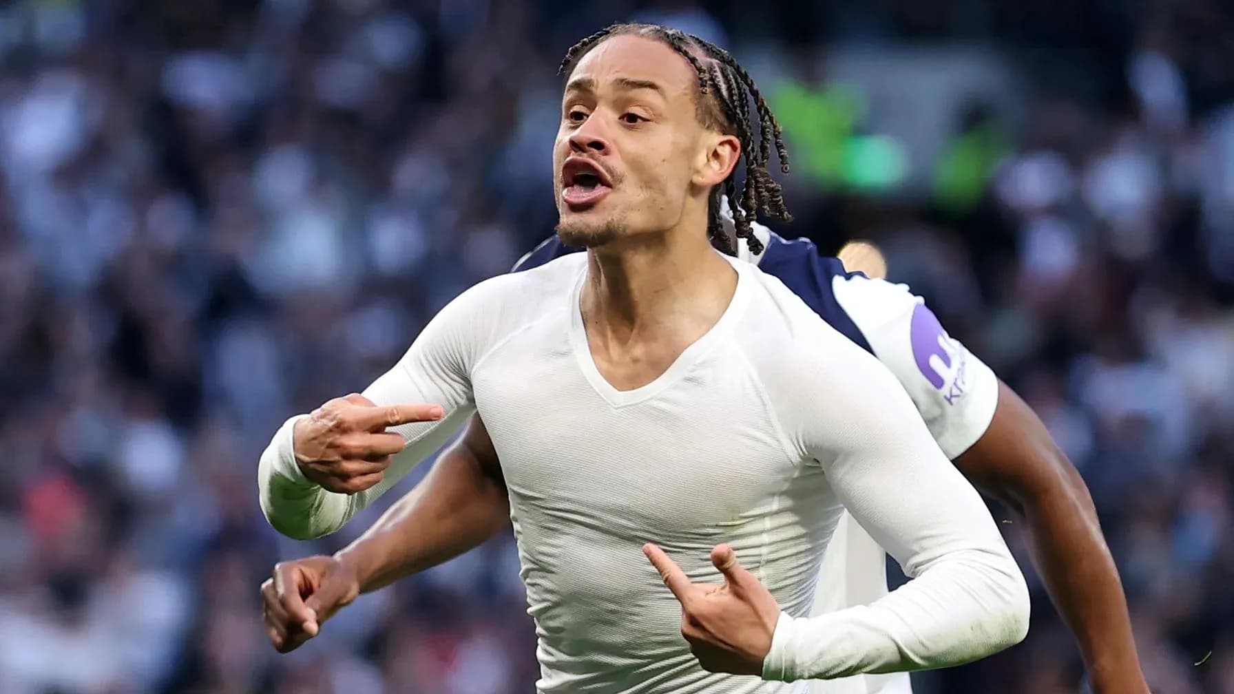 Player celebrating a goal with passionate gestures Player celebrating a goal with passionate gestures