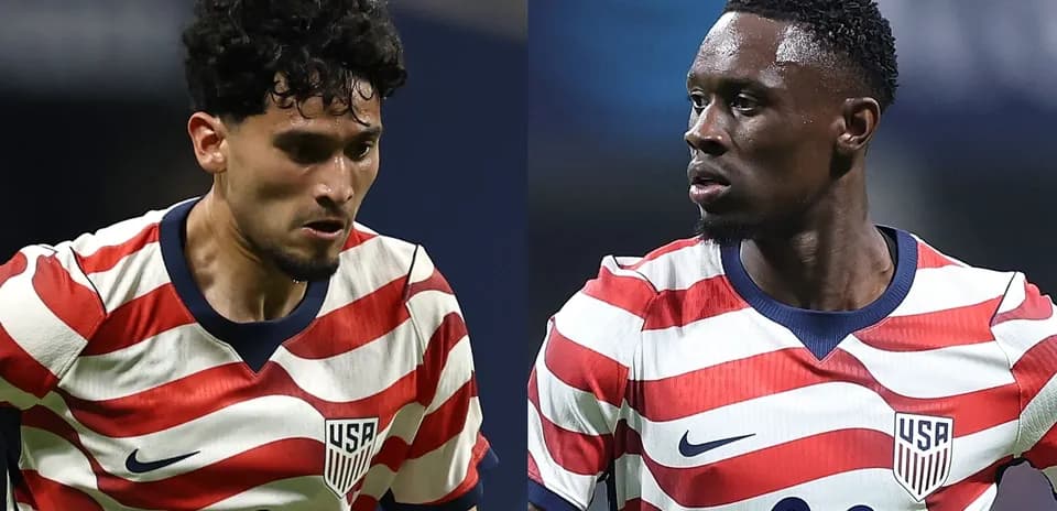 Two USA soccer players in red and white striped jerseys Two USA soccer players in red and white striped jerseys