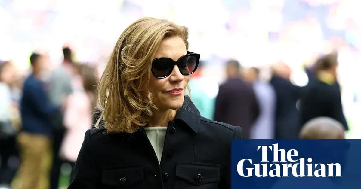 Woman in sunglasses at a sporting event Woman in sunglasses at a sporting event
