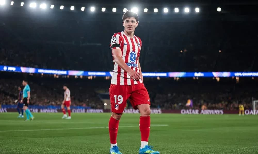 Player in Atlético Madrid kit during UEFA match Player in Atlético Madrid kit during UEFA match