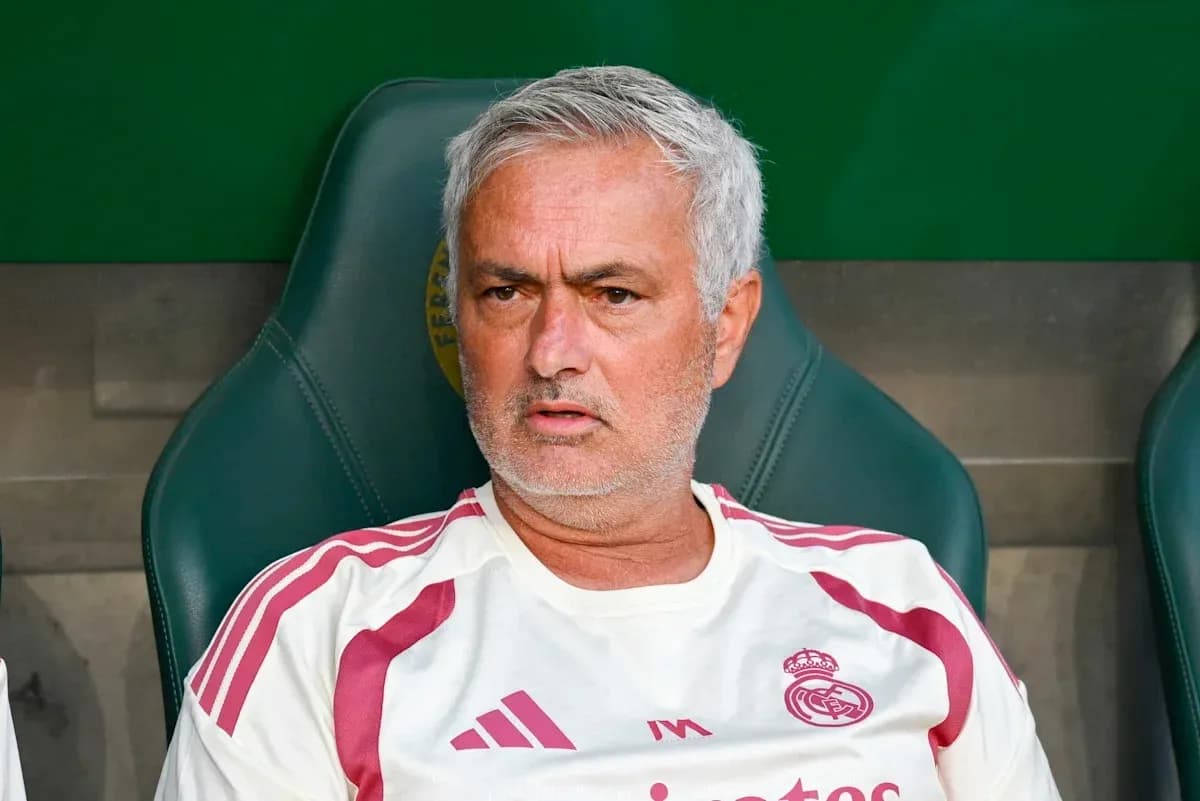 Coach sitting on the bench during a match Coach sitting on the bench during a match