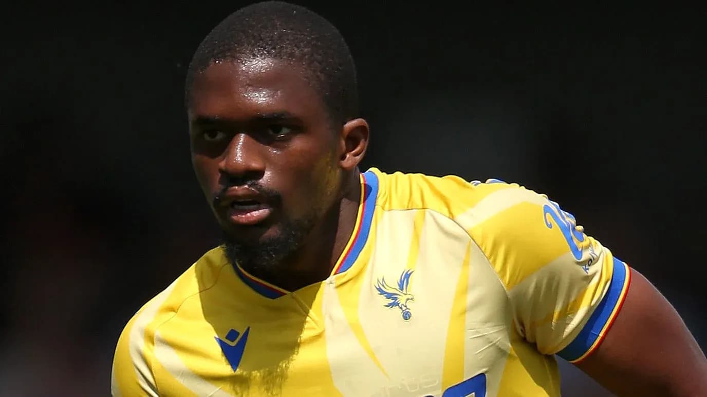 Player in yellow jersey running on the field Player in yellow jersey running on the field