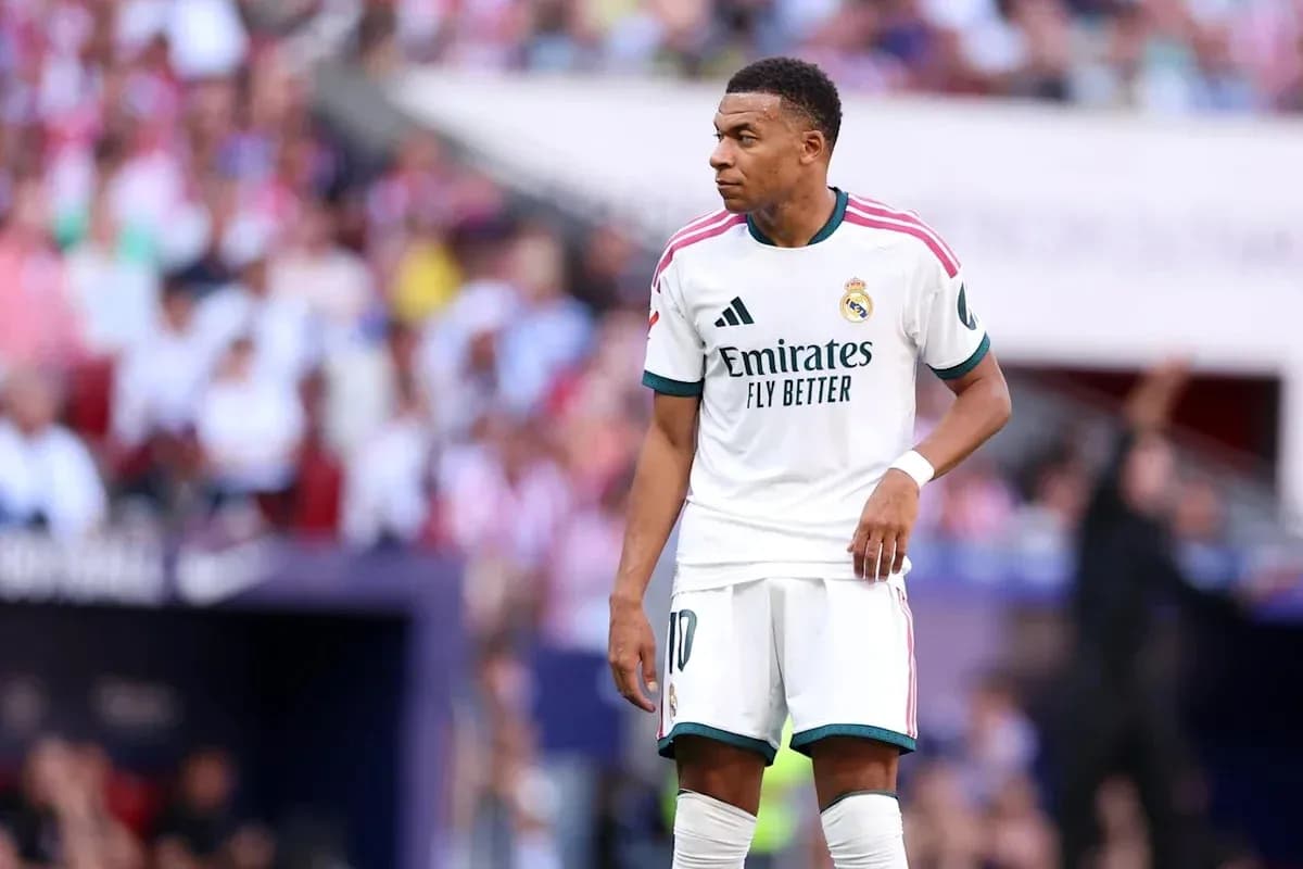 Player in Real Madrid kit on the field Player in Real Madrid kit on the field