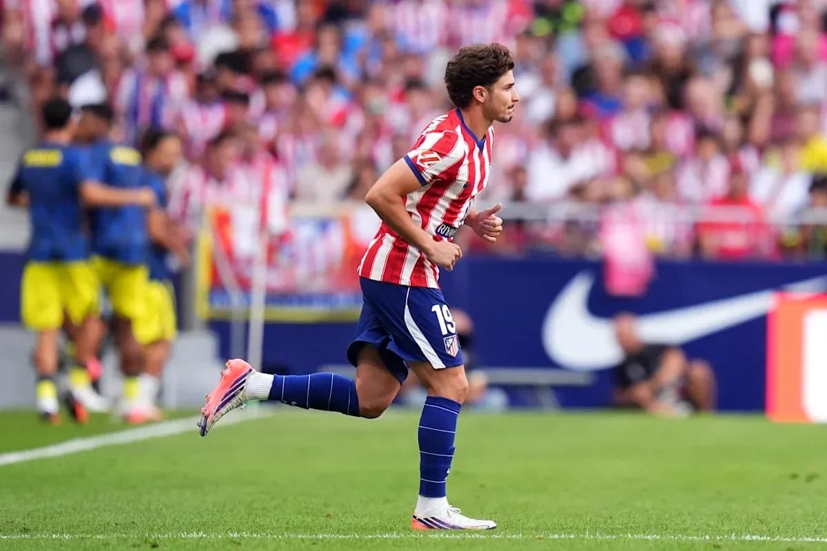 Player running on the field during a match Player running on the field during a match