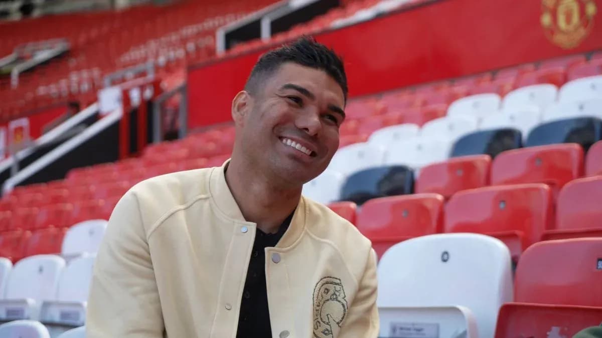 Player sitting in empty stadium seats at Old Trafford Player sitting in empty stadium seats at Old Trafford