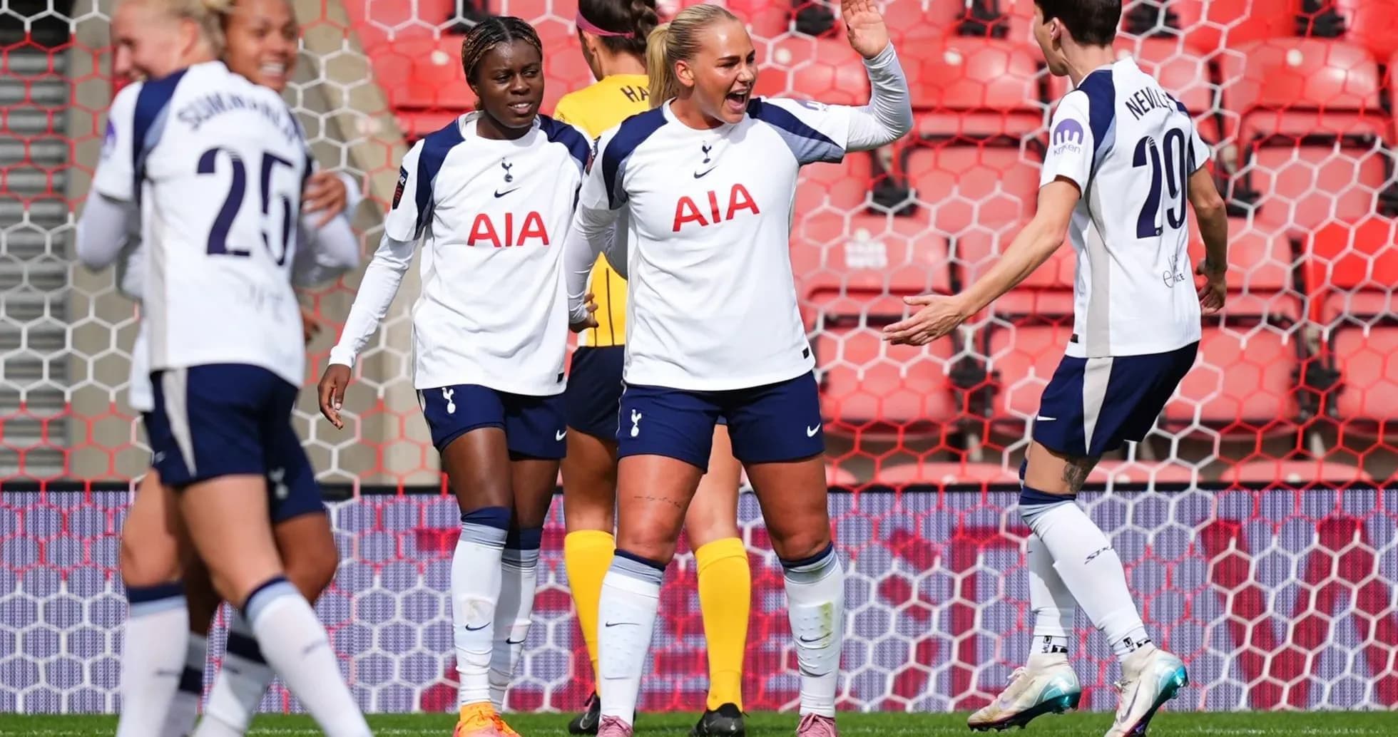Tottenham players celebrating a goal during match Tottenham players celebrating a goal during match