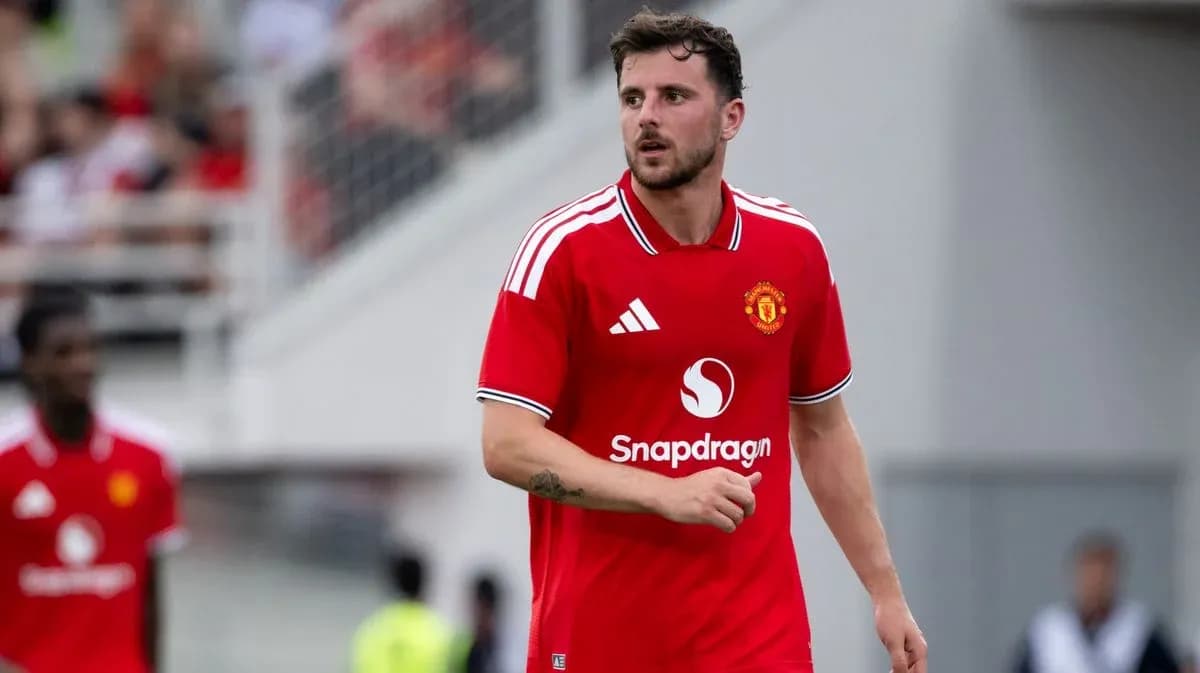 Player in red Manchester United jersey on the field Player in red Manchester United jersey on the field