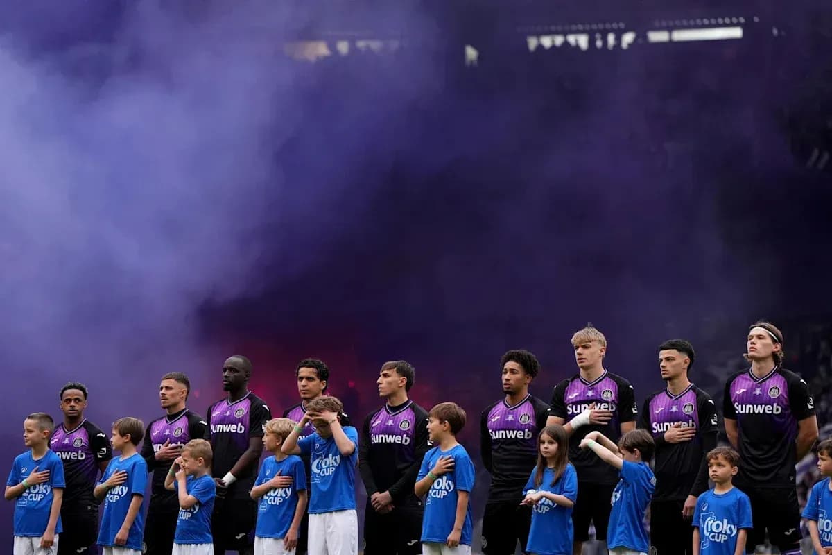 Players and children standing for the national anthem Players and children standing for the national anthem
