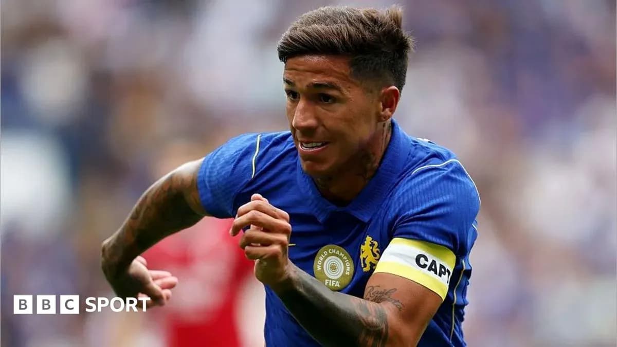 Player running with ball during football match Player running with ball during football match