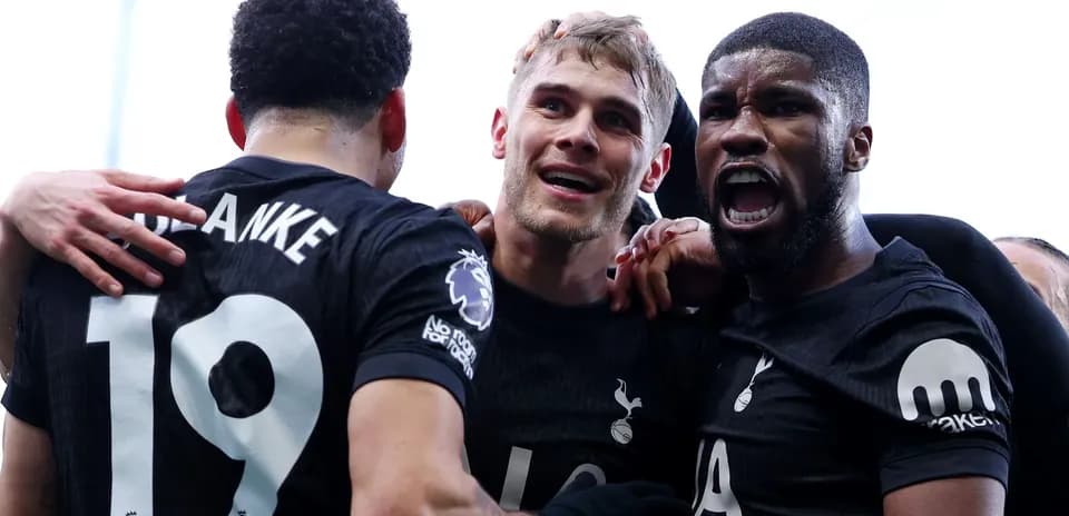 Tottenham players celebrating a goal together Tottenham players celebrating a goal together