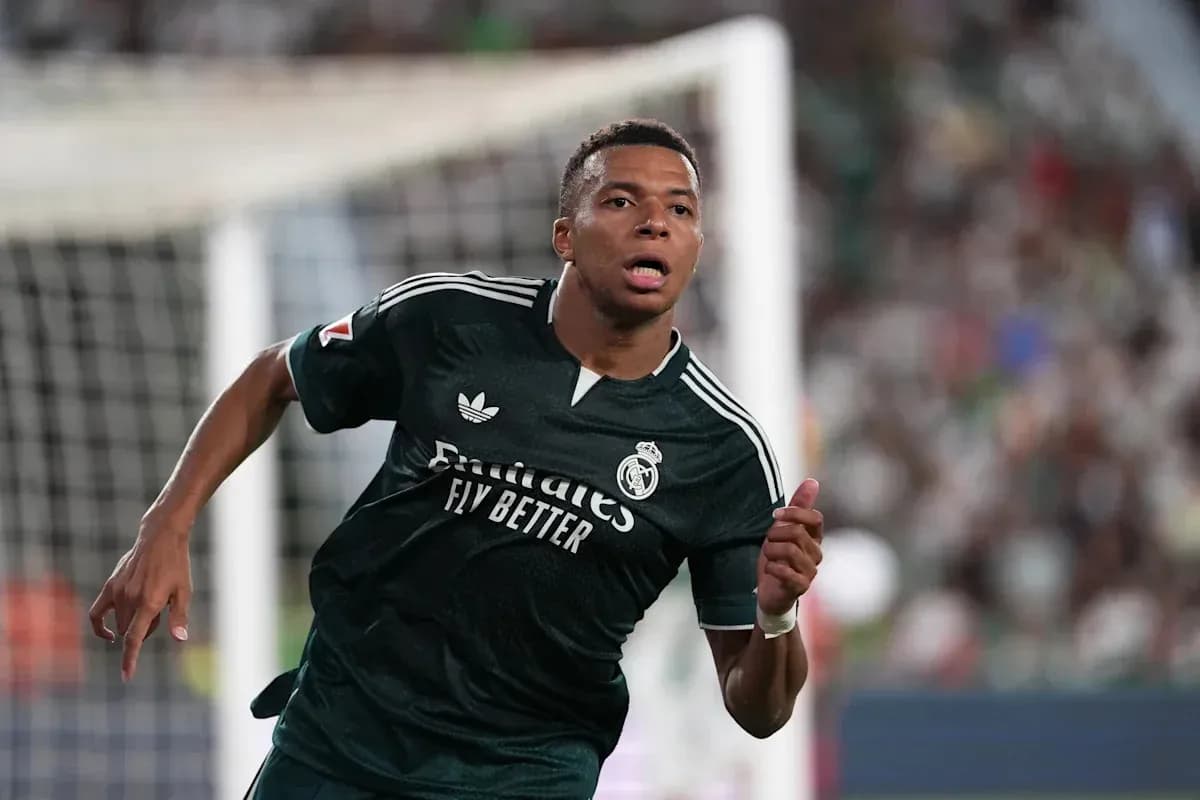 Player celebrating a goal in Real Madrid kit Player celebrating a goal in Real Madrid kit