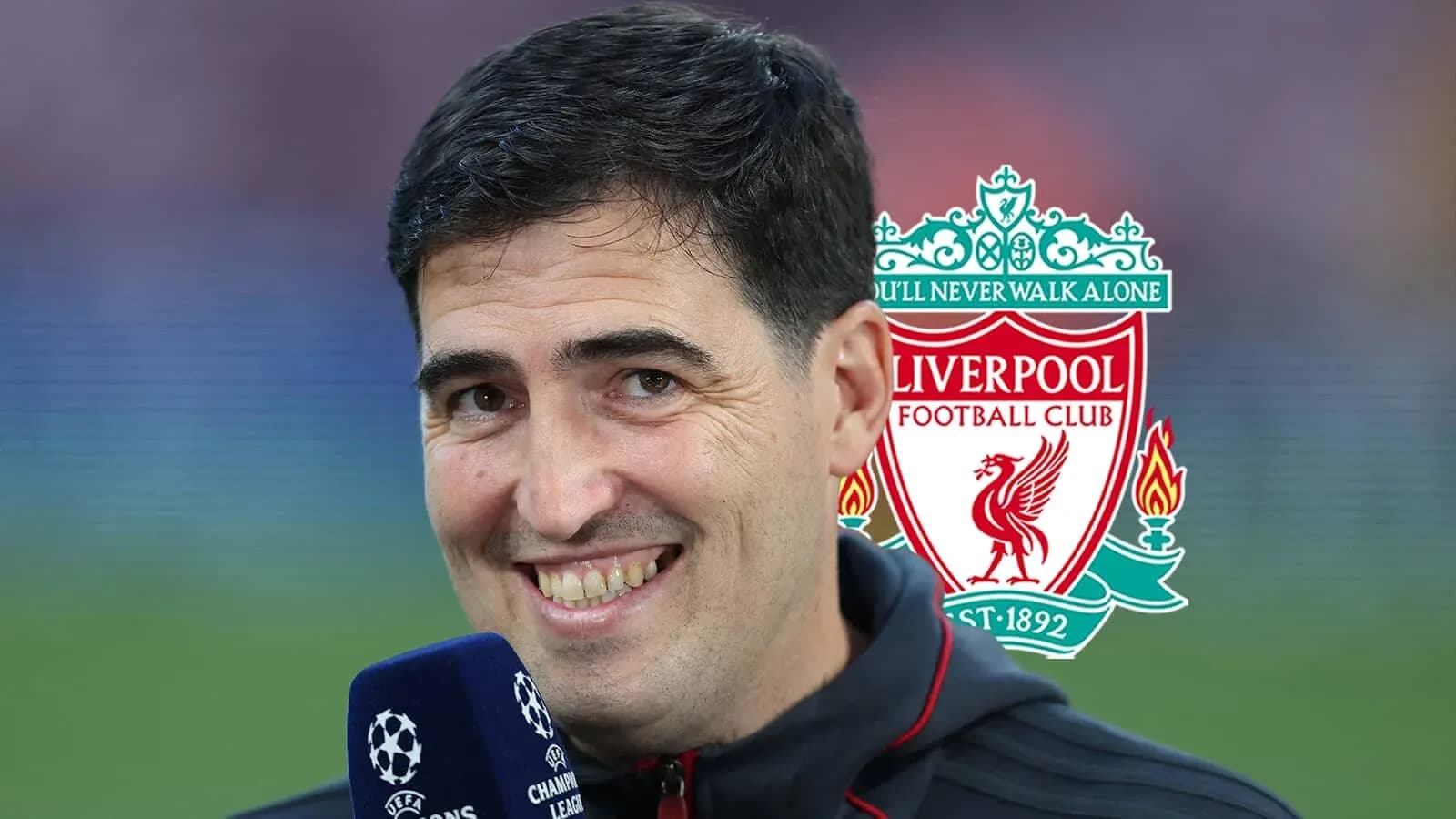 Person speaking into microphone with Liverpool logo in background Person speaking into microphone with Liverpool logo in background