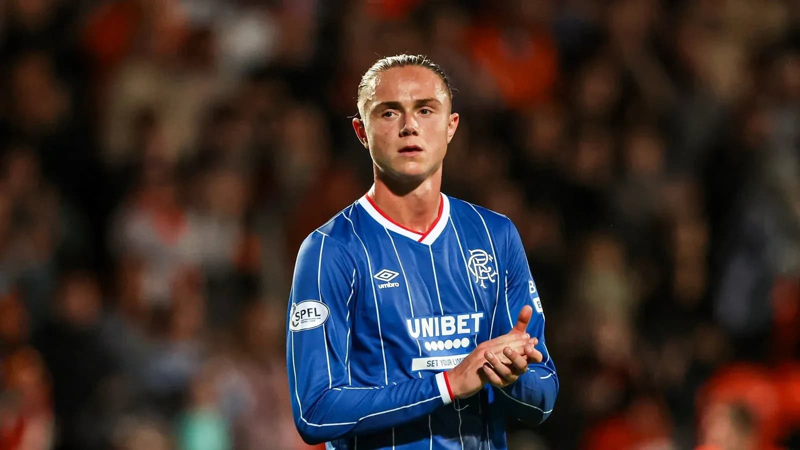 Player applauding fans during a match Player applauding fans during a match