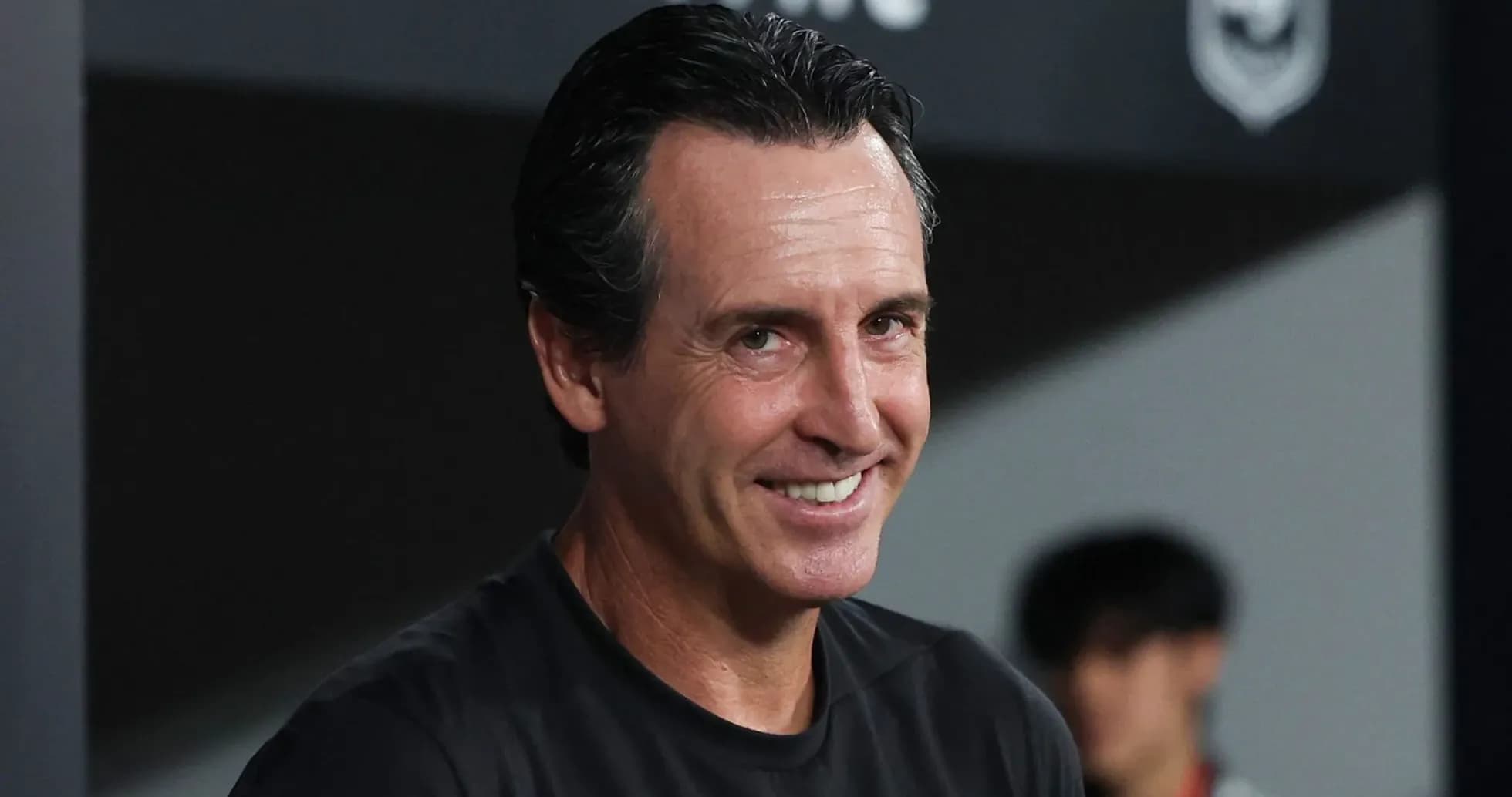 Coach smiling during a match preparation Coach smiling during a match preparation