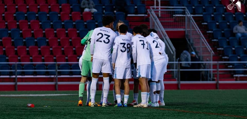 New York City II players huddling before match New York City II players huddling before match