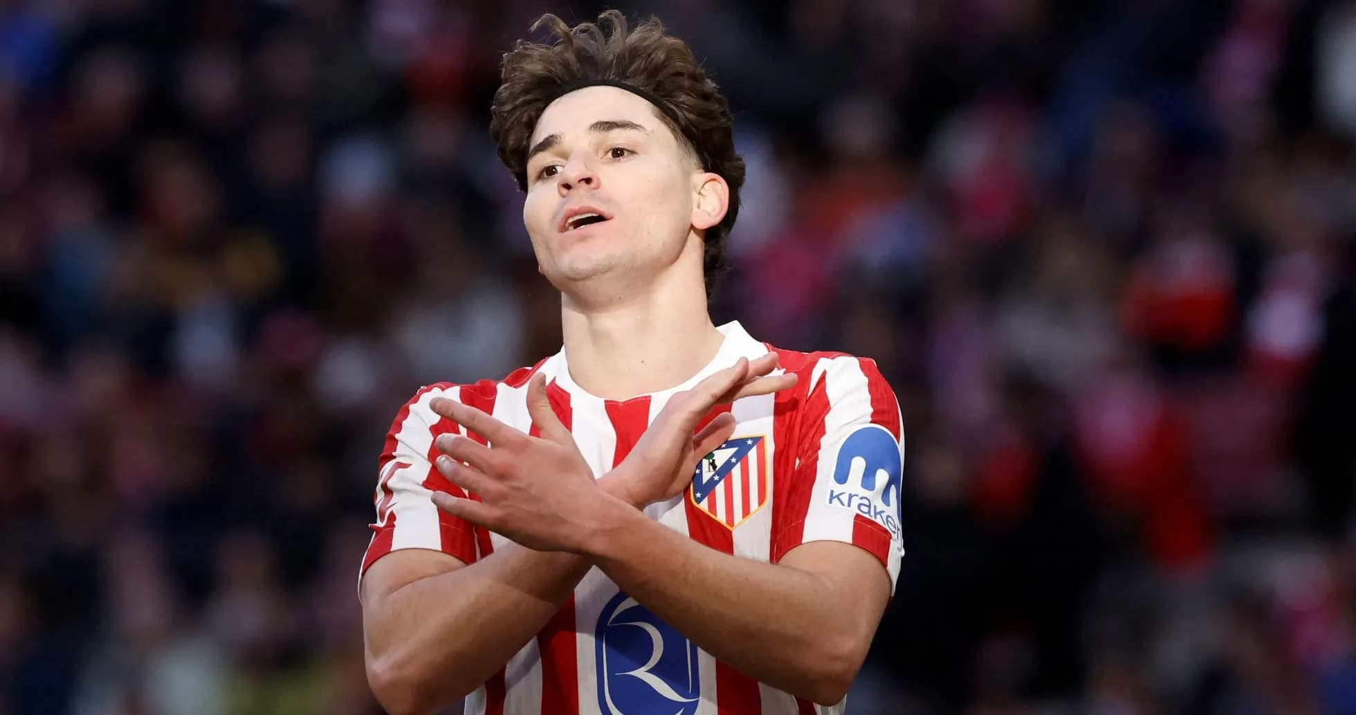 Player gesturing during match for Atlético Madrid Player gesturing during match for Atlético Madrid