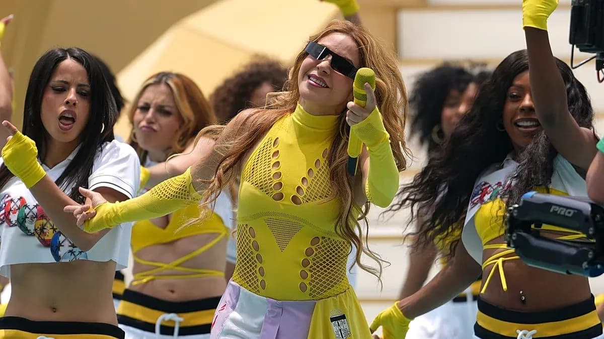 Dancers performing with bright outfits and microphones Dancers performing with bright outfits and microphones
