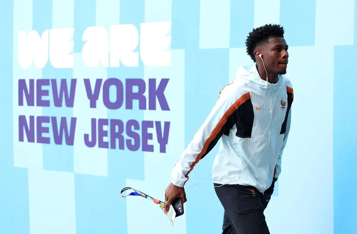 Player walking past 'We Are New York New Jersey' sign Player walking past 'We Are New York New Jersey' sign