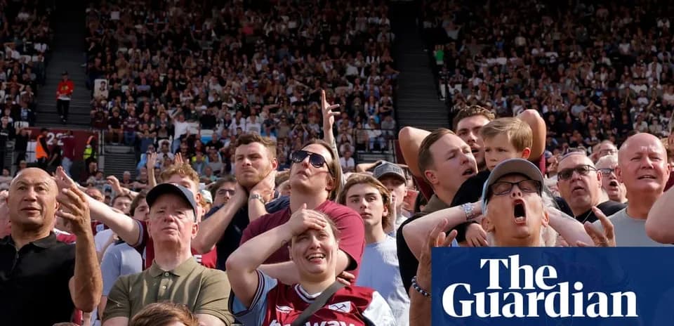Crowd reacting during a football match at stadium Crowd reacting during a football match at stadium