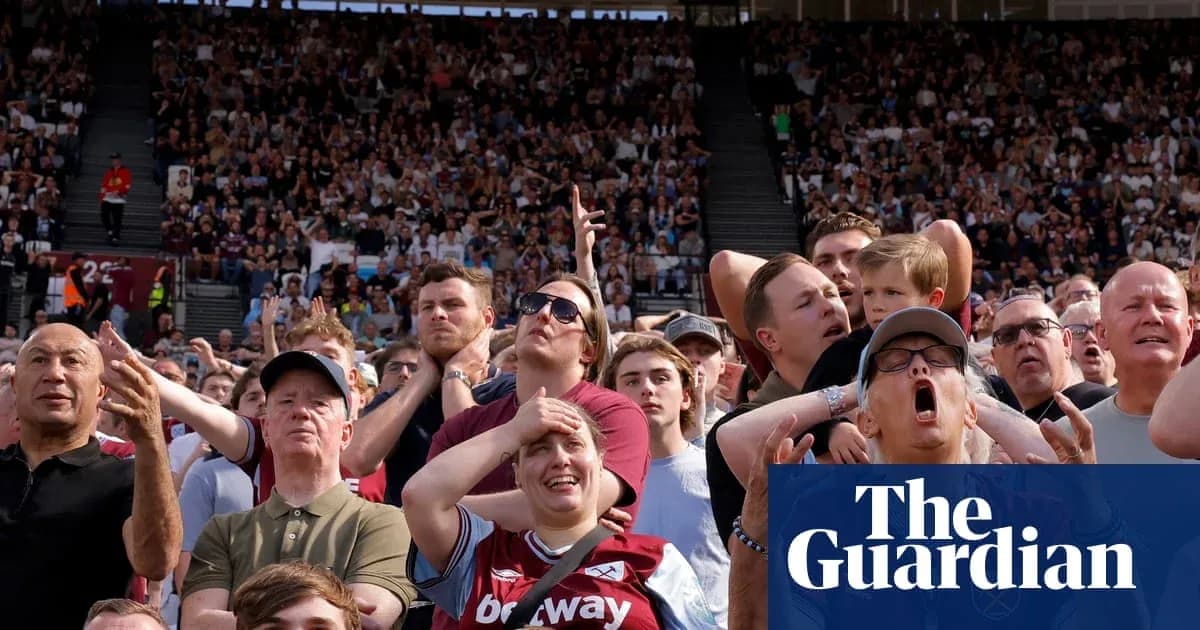 Crowd reacting during a football match at stadium Crowd reacting during a football match at stadium