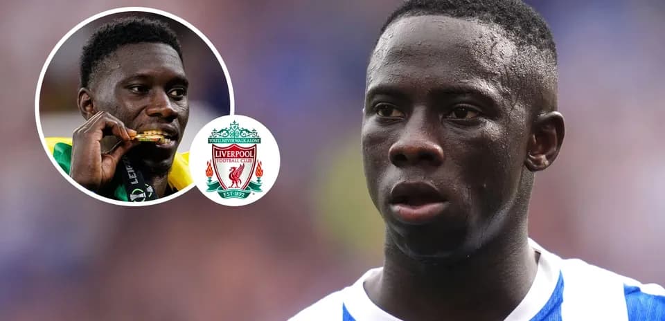 Player in blue jersey during match with Liverpool logo Player in blue jersey during match with Liverpool logo