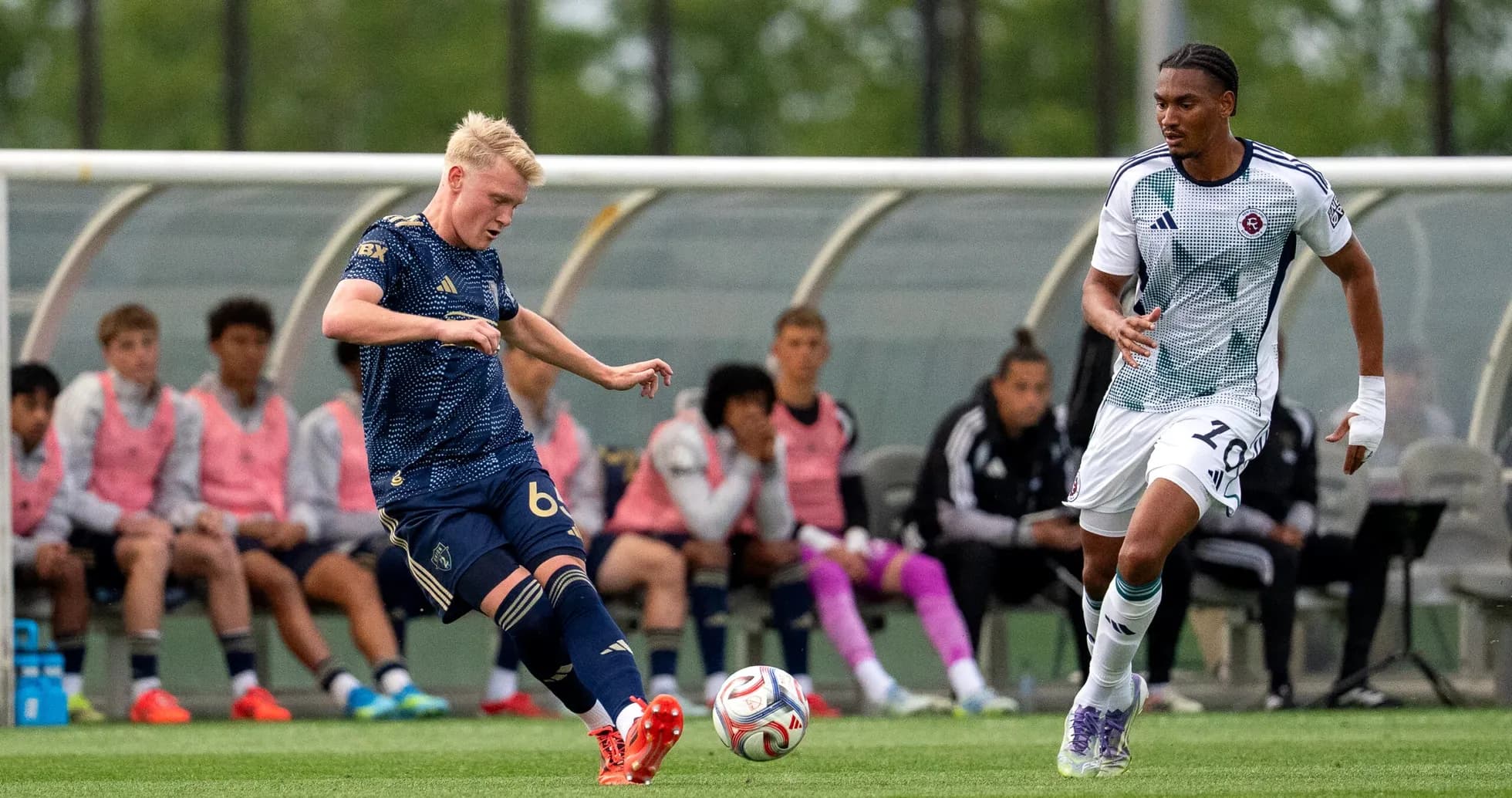 Players competing for the ball in MLS Next Pro Players competing for the ball in MLS Next Pro