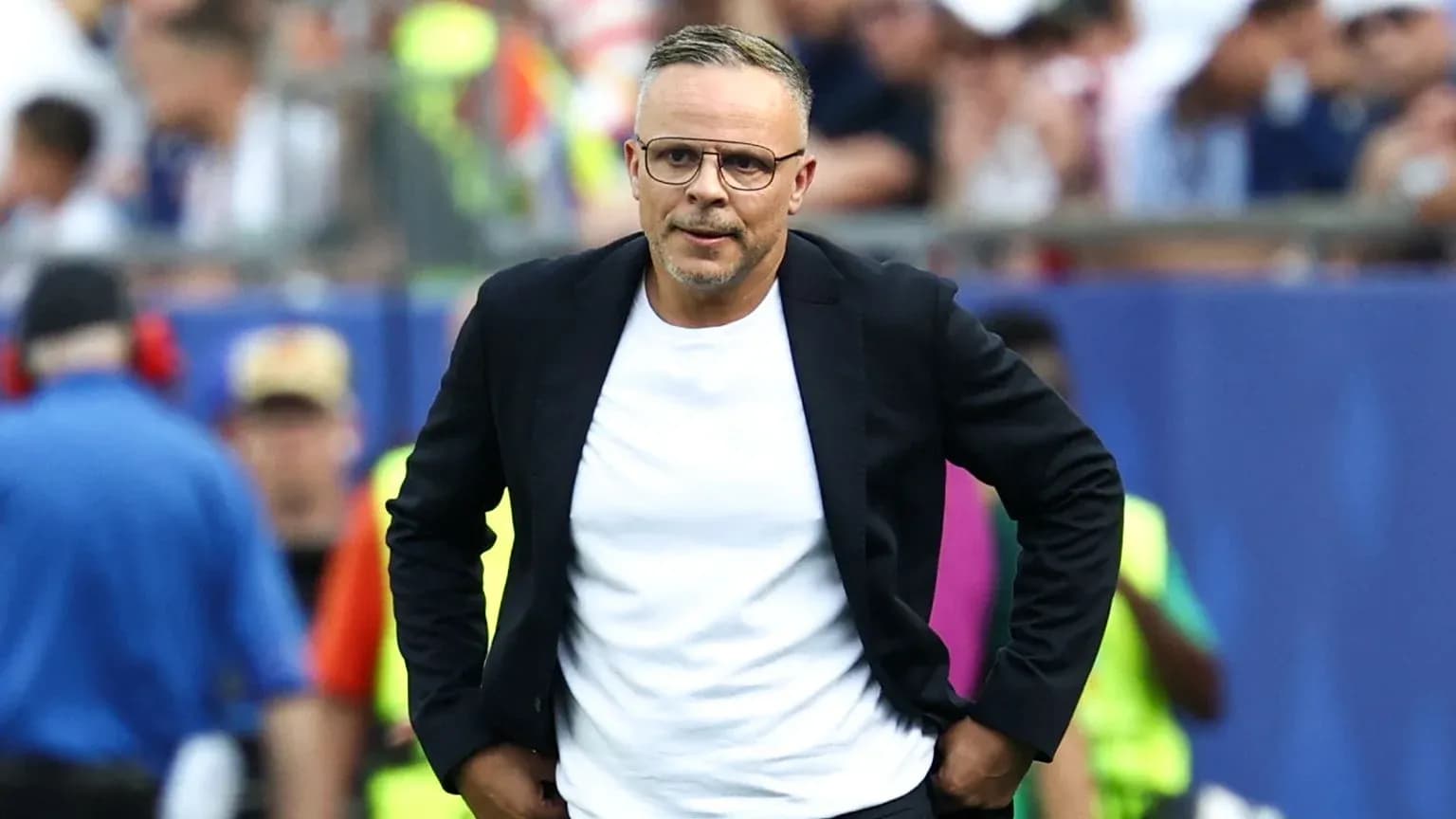 Coach walking on the sideline during match Coach walking on the sideline during match