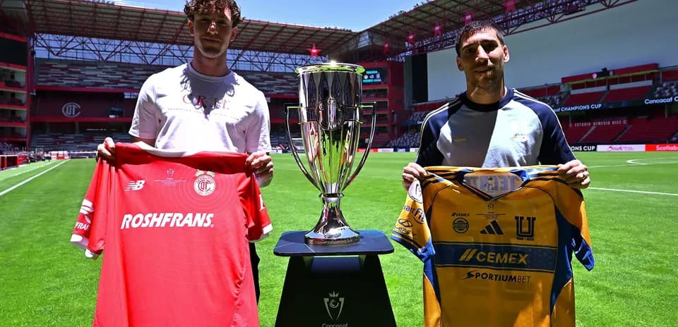 Players holding jerseys before Champions League match Players holding jerseys before Champions League match