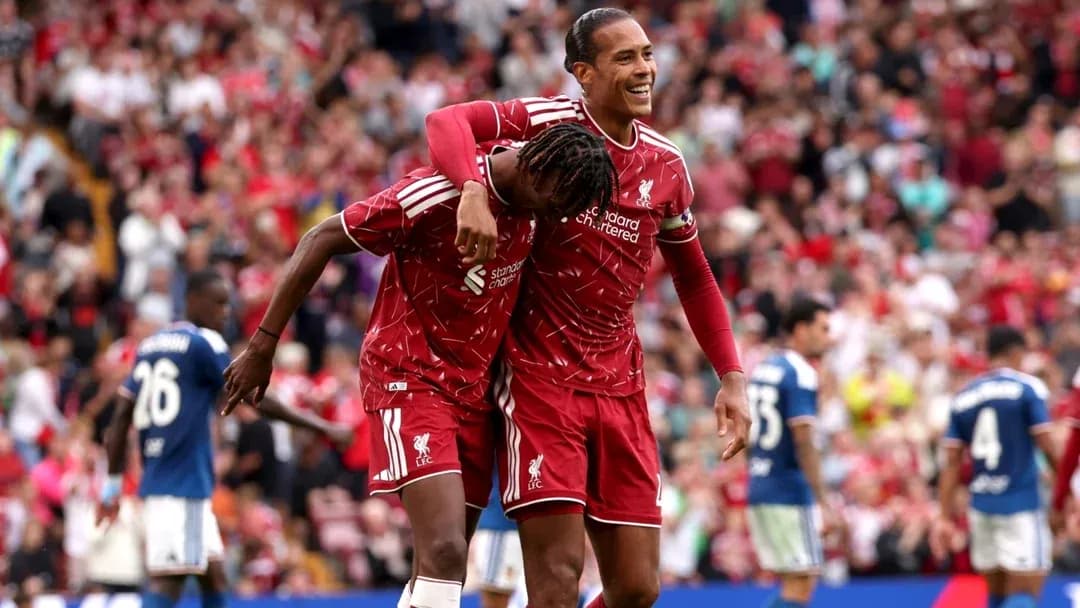 Liverpool players celebrating a goal during match Liverpool players celebrating a goal during match