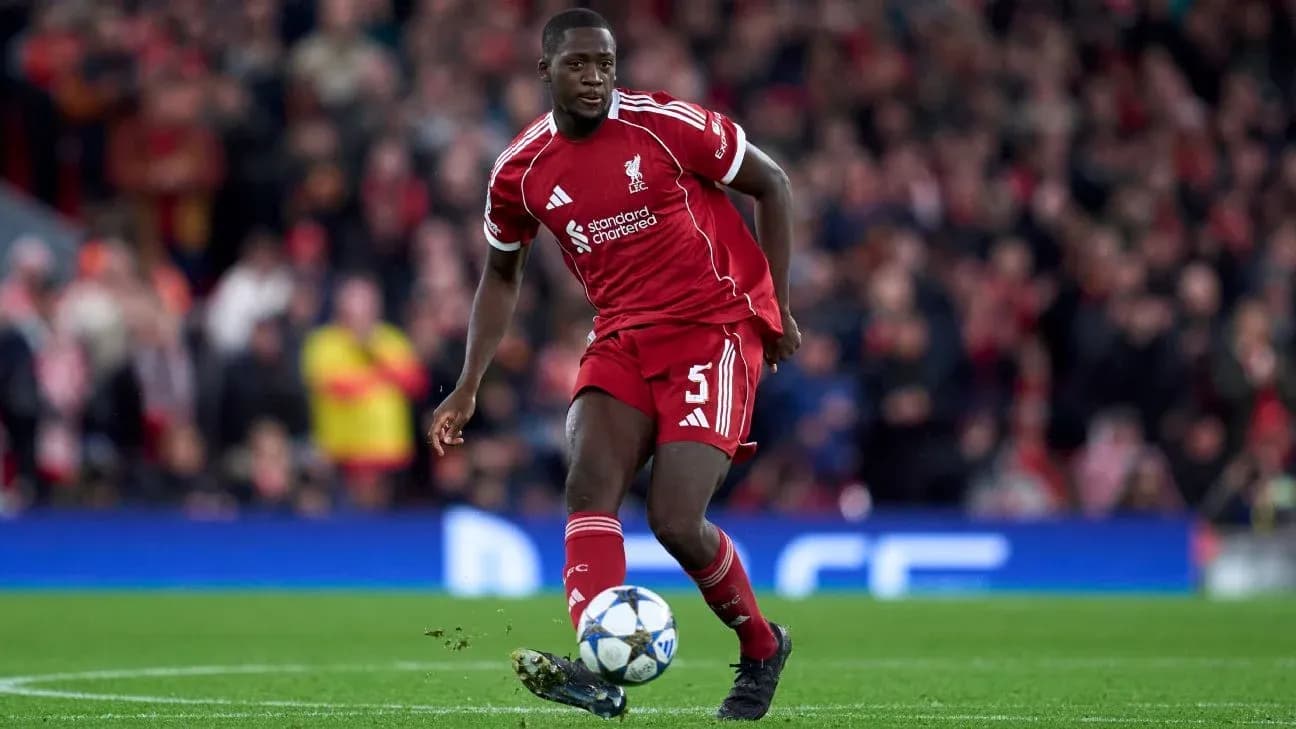 Liverpool player dribbling the ball during match Liverpool player dribbling the ball during match