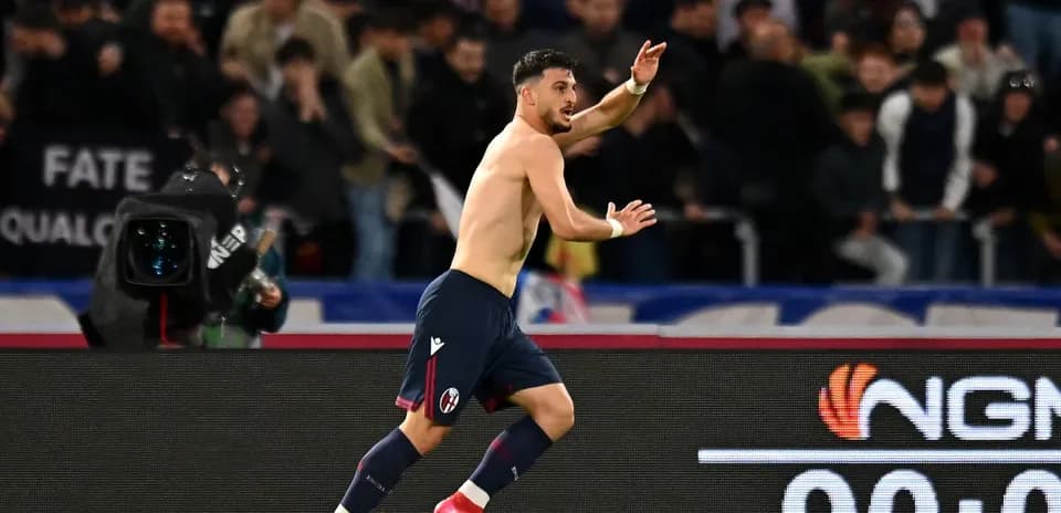 Bologna player celebrating after scoring a goal Bologna player celebrating after scoring a goal