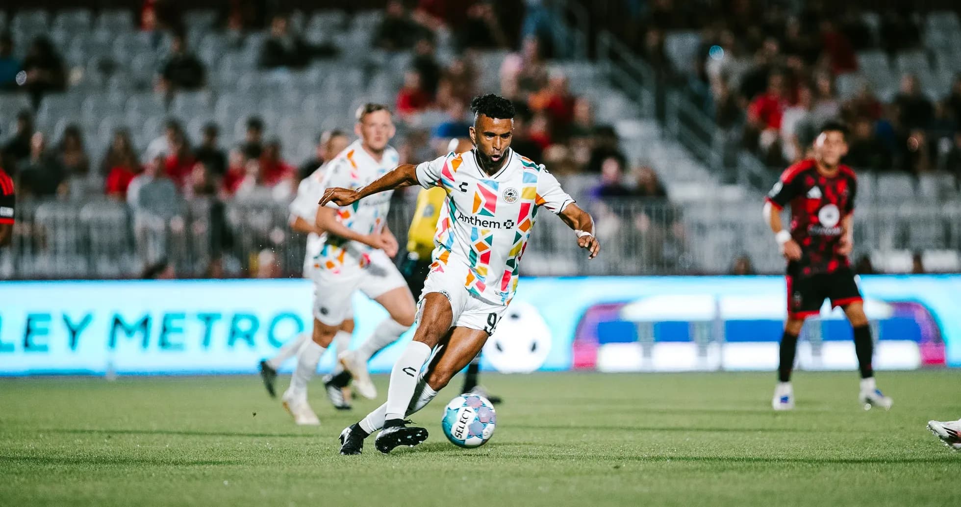 Player dribbling the ball during Phoenix Rising match Player dribbling the ball during Phoenix Rising match