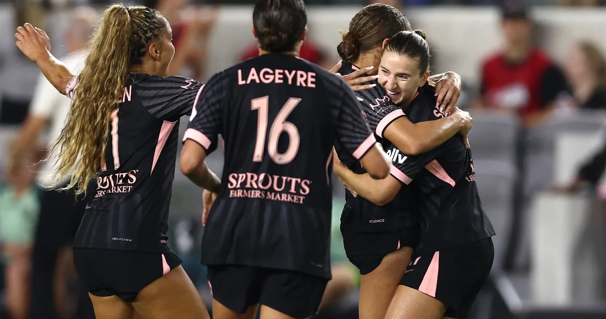 Washington Spirit players celebrating a goal Washington Spirit players celebrating a goal