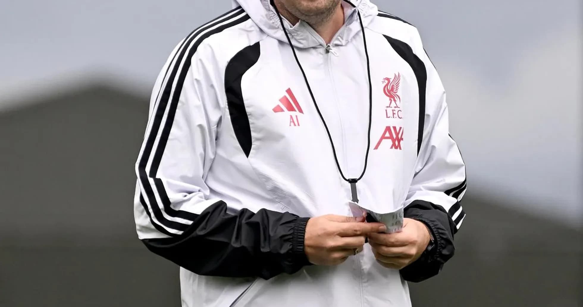 Liverpool coach smiling during training session Liverpool coach smiling during training session