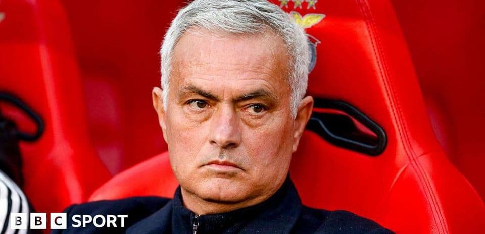 Manager seated on bench during match Manager seated on bench during match