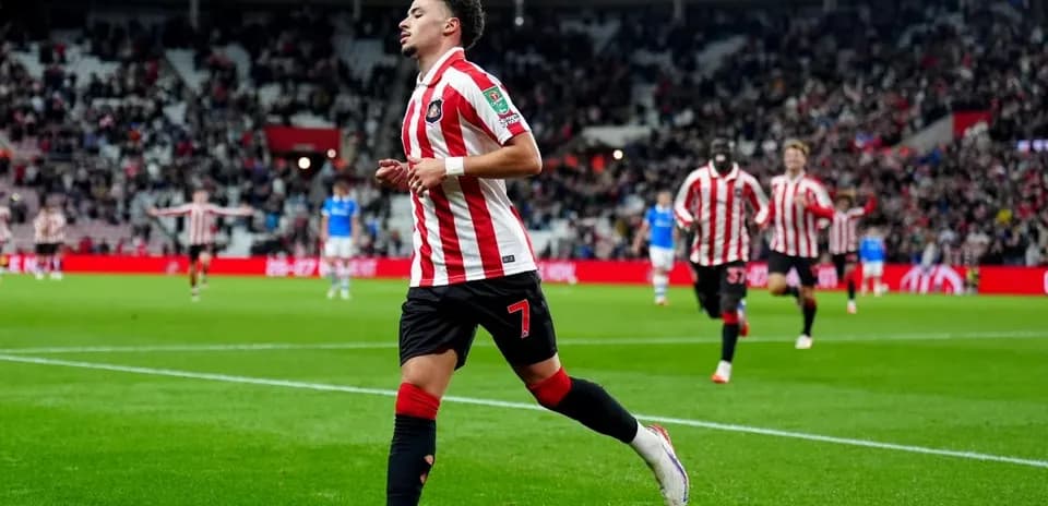 Player celebrating a goal during match at stadium Player celebrating a goal during match at stadium