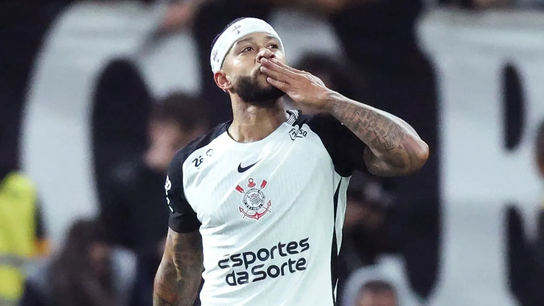 Player celebrating and blowing a kiss after scoring Player celebrating and blowing a kiss after scoring