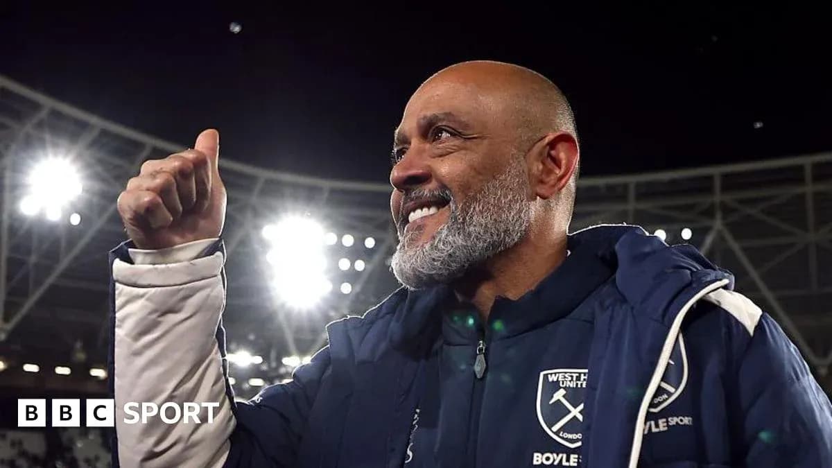 Coach celebrating with a thumbs-up gesture Coach celebrating with a thumbs-up gesture