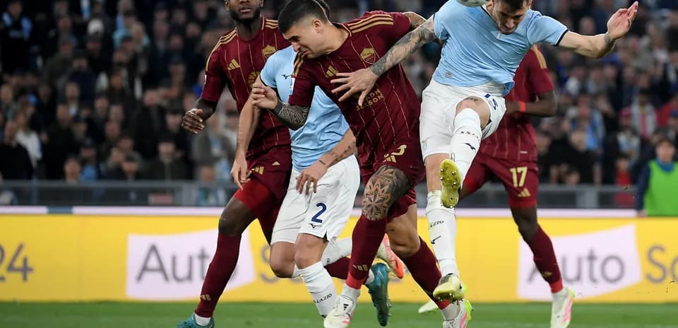 AS Roma and Lazio players contesting for the ball AS Roma and Lazio players contesting for the ball