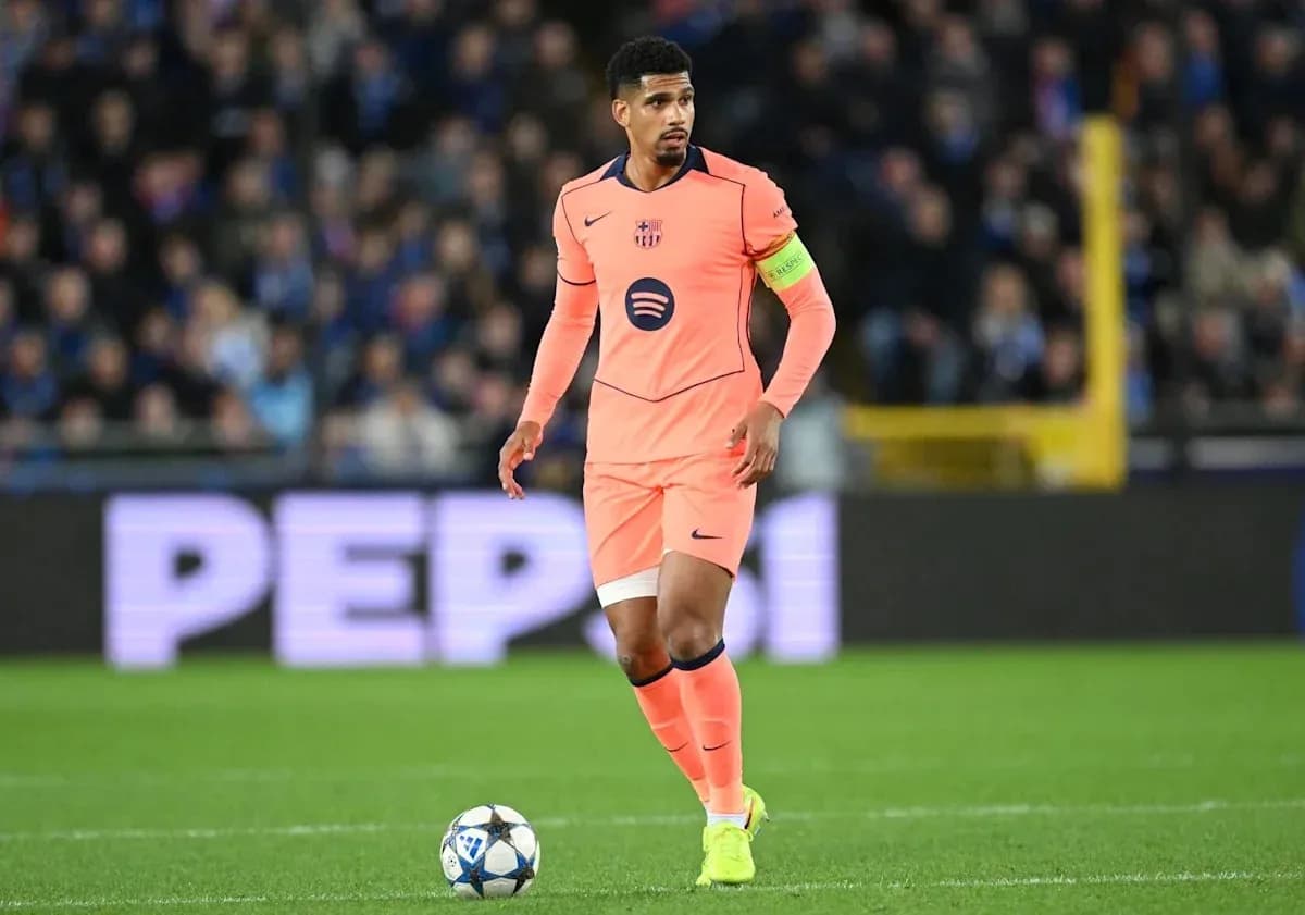 Player in pink uniform during football match Player in pink uniform during football match