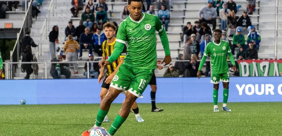 Hartford Athletic player preparing to kick the ball Hartford Athletic player preparing to kick the ball