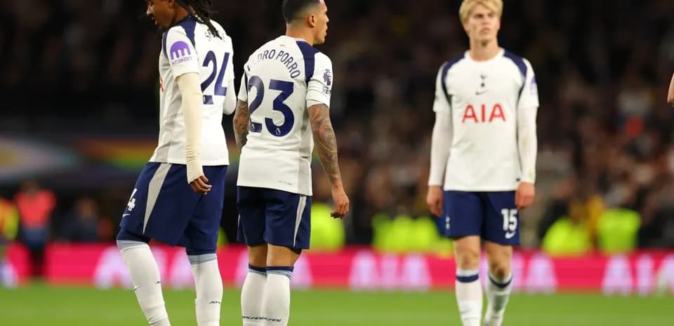 Tottenham players on the pitch during a match Tottenham players on the pitch during a match
