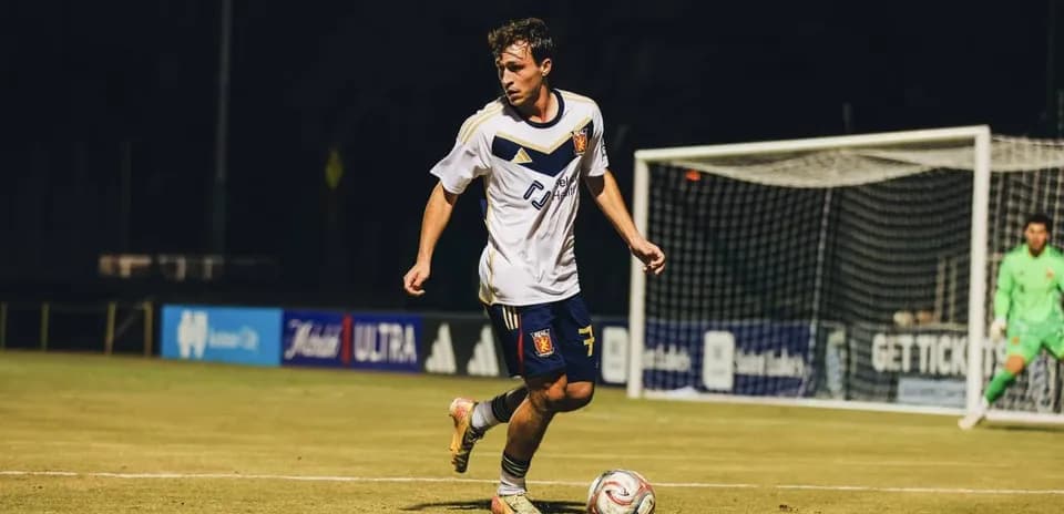 Player dribbling the ball during match Player dribbling the ball during match